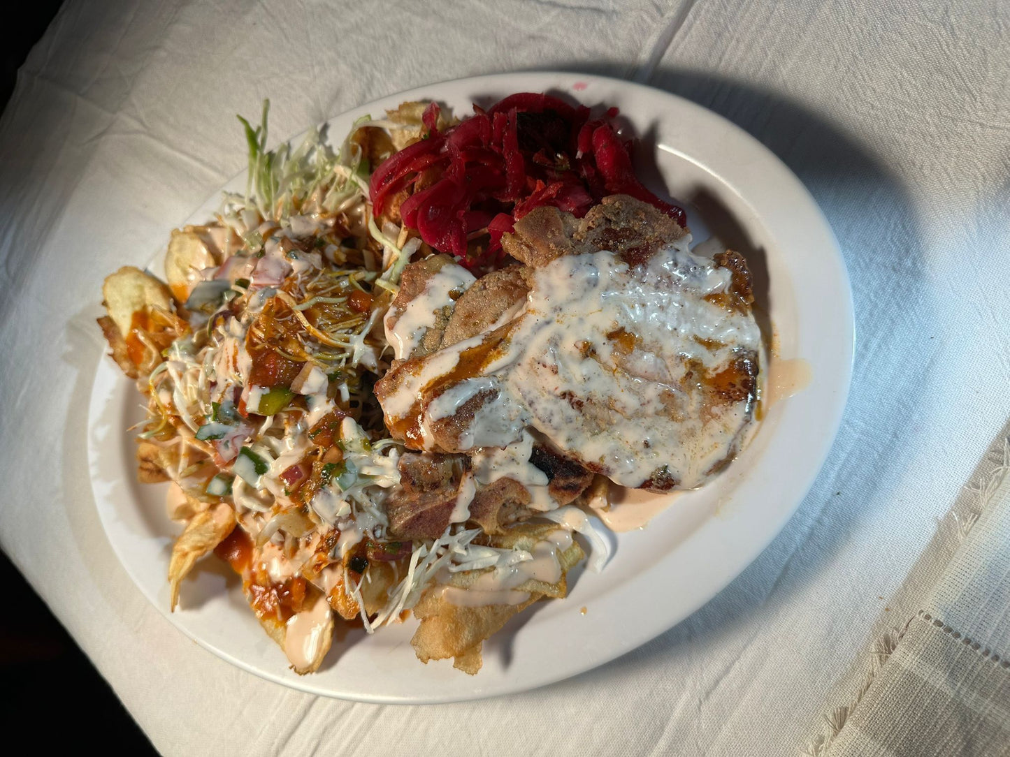 Chuleta con tajadas, pork chop with banana slices