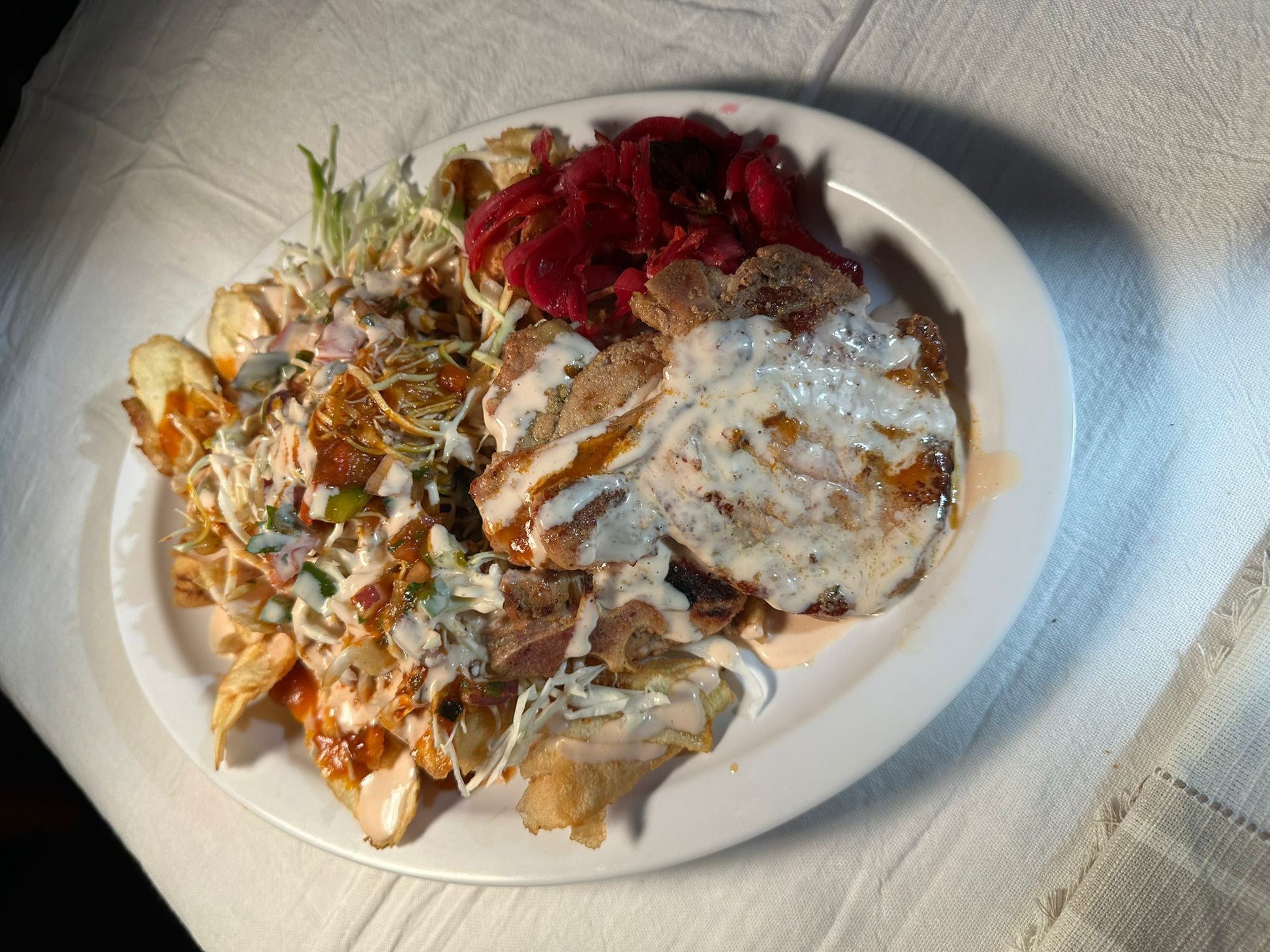 Chuleta con tajadas, pork chop with banana slices